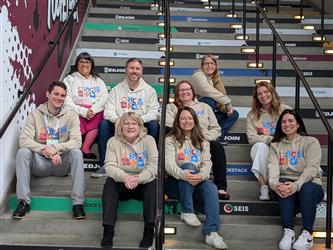 A group of people posing for a picture at Codestack Conference.