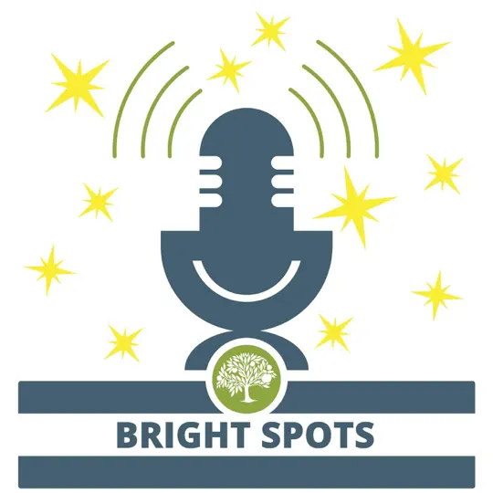Logo for the ‘Bright Spots’ podcast featuring a stylized dark blue microphone. Green sound waves radiate from the microphone, surrounded by yellow star shapes. Below the microphone is the Charter SELPA logo, a small green circle with a white tree icon, and the words ‘BRIGHT SPOTS’ appear in bold capital letters underneath.
