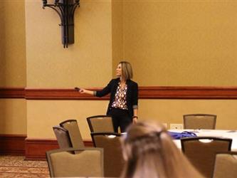 A woman presenting at an event