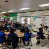 Caliber Schools teacher Katie Bishop teaching in an inclusive classroom. The school has prioritized enabling all students, including those with disabilities, to learn from and alongside one another.
